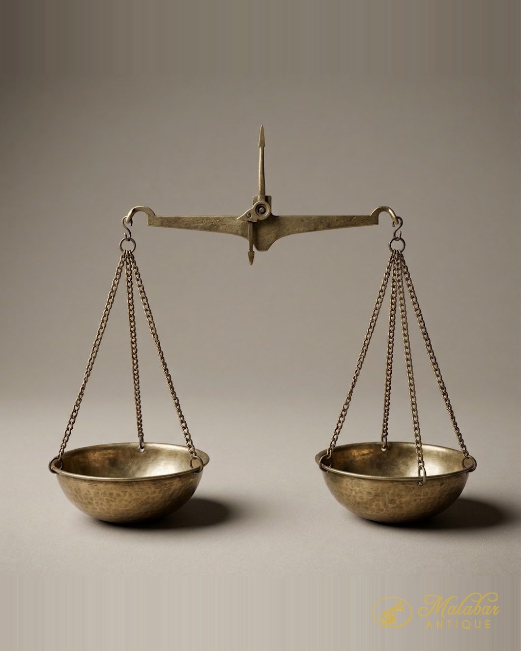 Merchant's balance with two brass pans on chains and an iron beam.