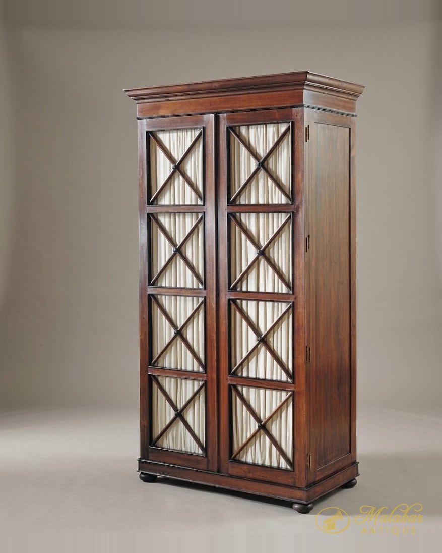 Tall two-door cabinet with astragal glazing and a moulded cornice.