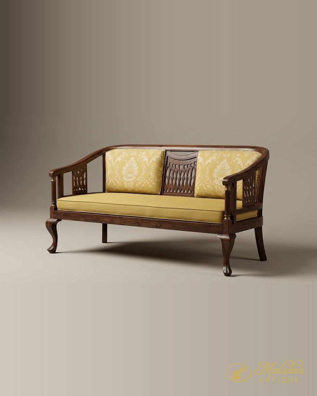 Carved hardwood settee with pierced panels and a buttoned yellow seat.